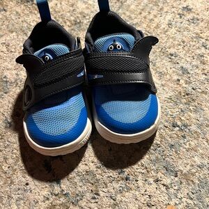 Nike Blue Kids Sneakers with Character Design